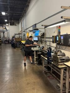 Josh testing a tool in shop